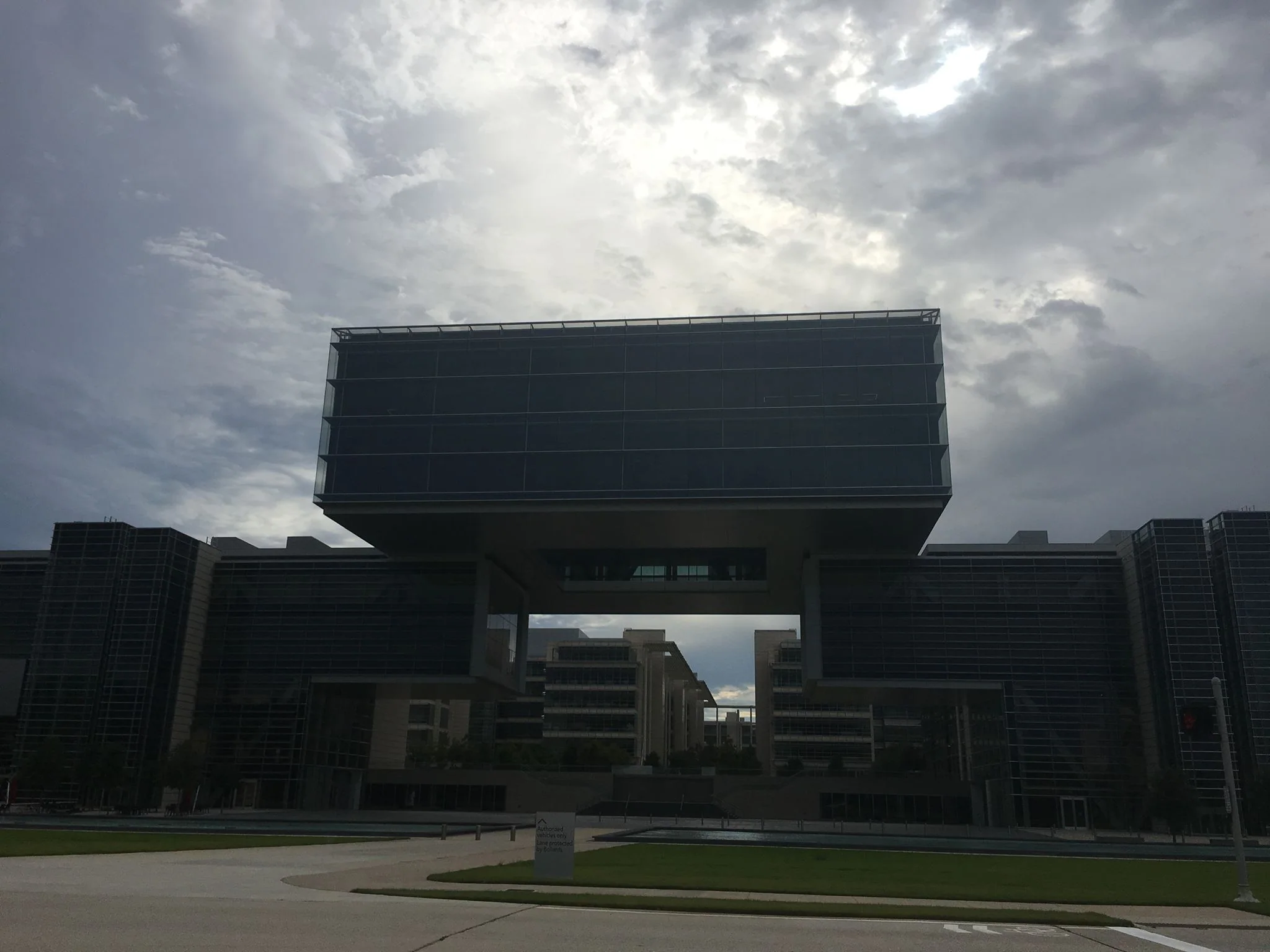 ExxonMobil's Houston, Texas headquarters — an architectural masterpiece with a square volume suspended in the air, where Dev3lop delivered on-site Tableau consulting